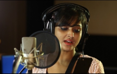 Actress Remya Nambeesan Singing Song in Koothan Stills